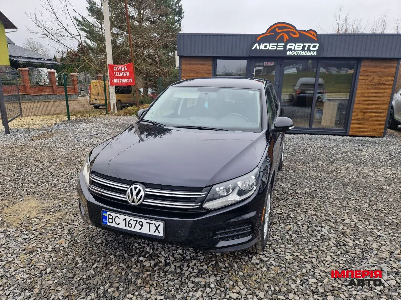 Volkswagen Tiguan - фото 1