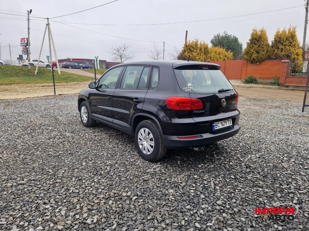 Volkswagen Tiguan - фото 8