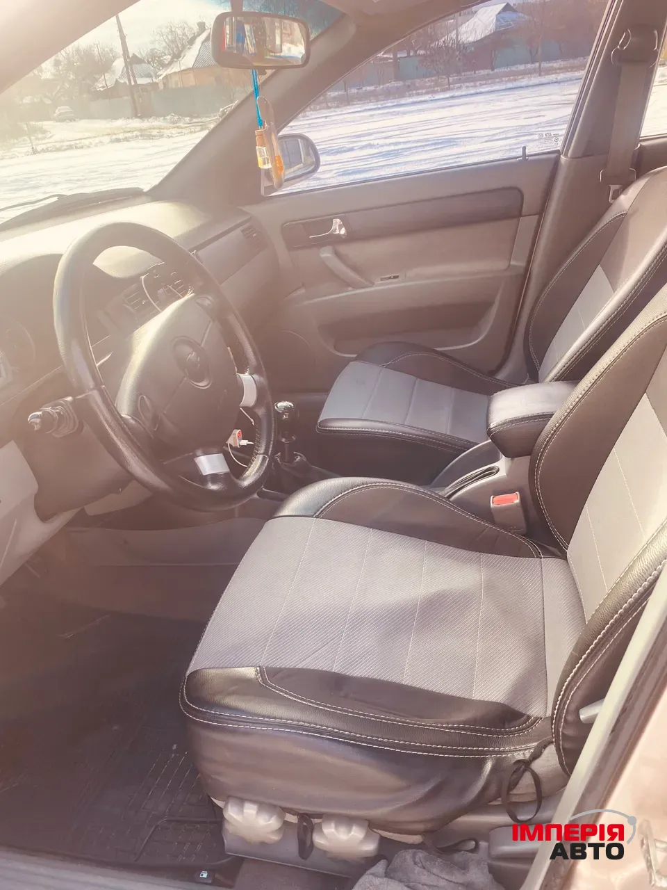 Chevrolet Lacetti - фото 13