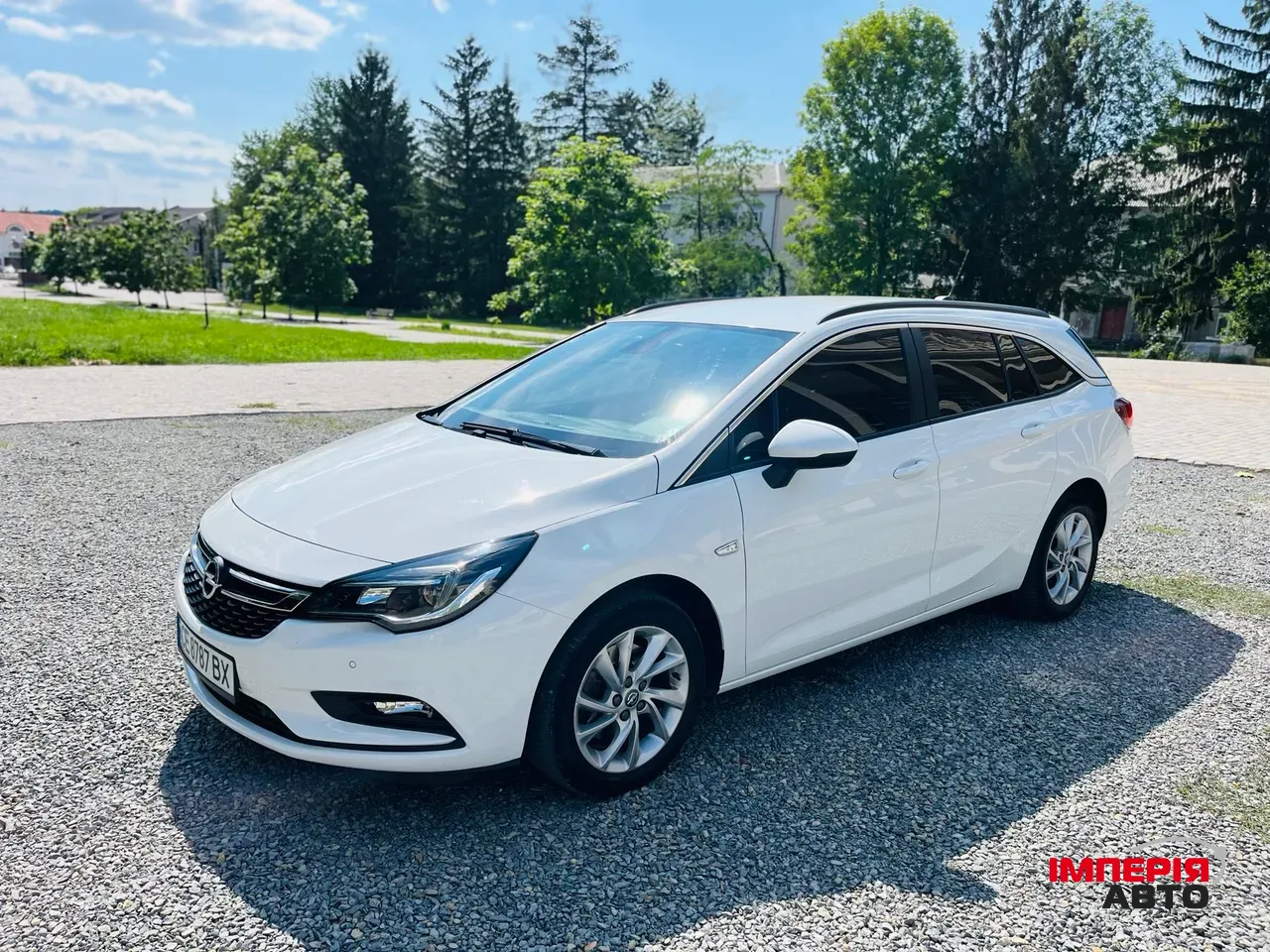 Opel Astra - фото 24