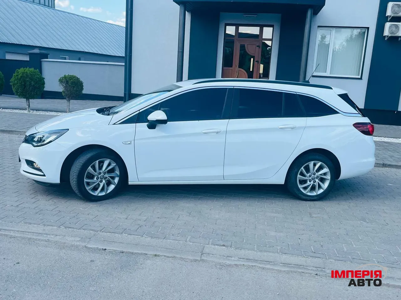 Opel Astra - фото 11