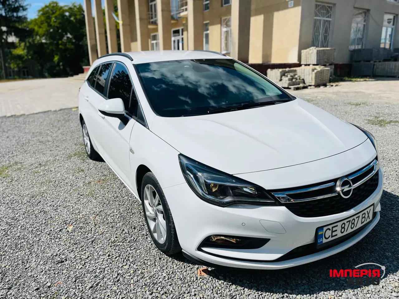 Opel Astra - фото 25