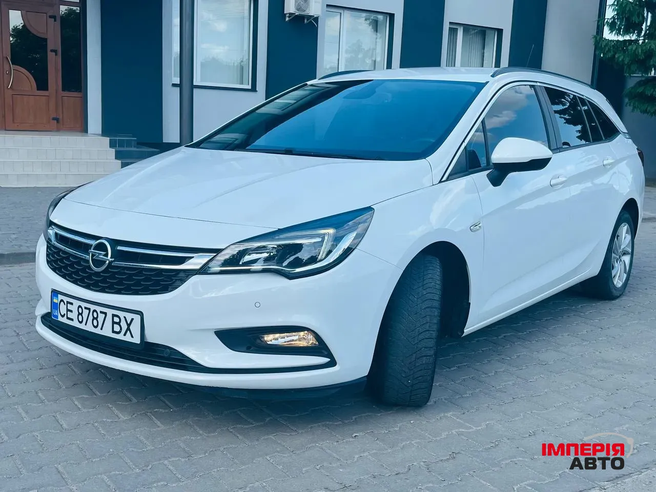 Opel Astra - фото 10
