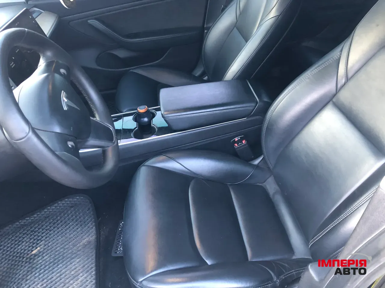 Tesla Model 3 - фото 11