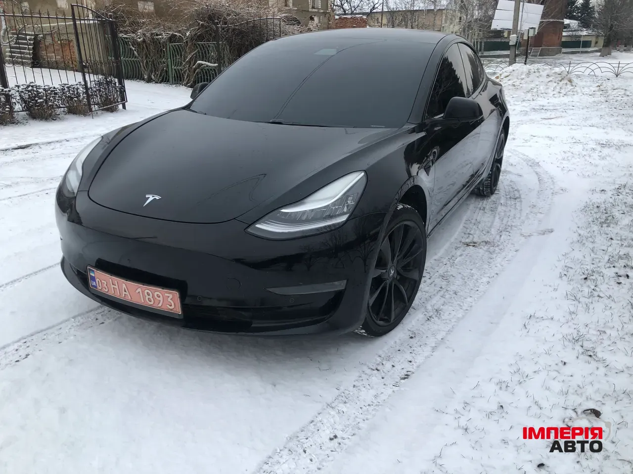 Tesla Model 3 - фото 1