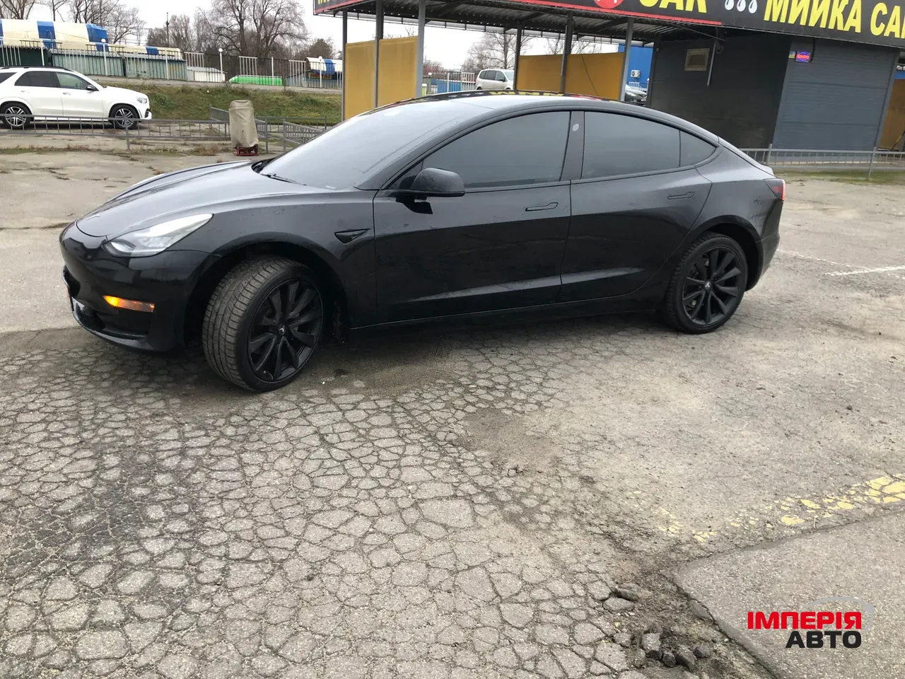 Tesla Model 3 - фото 19