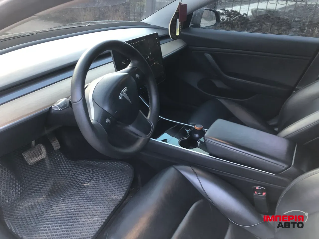Tesla Model 3 - фото 12