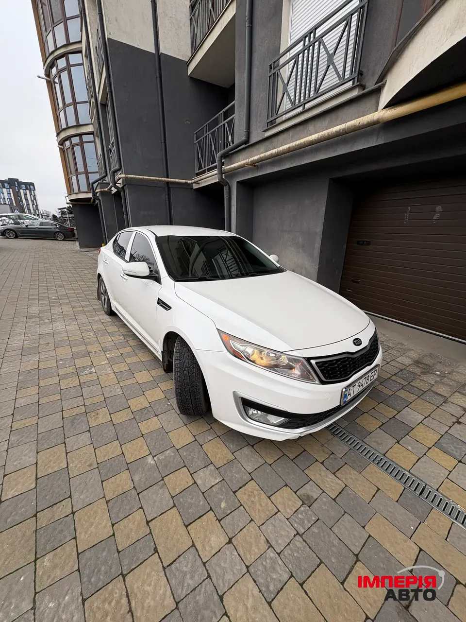 Kia Optima - фото 7