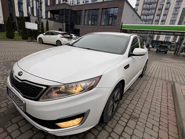Kia Optima - фото 5