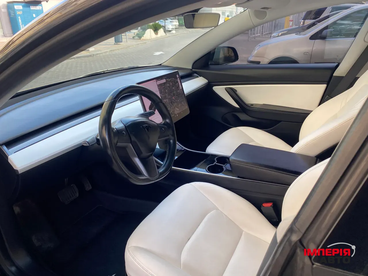 Tesla Model 3 - фото 10