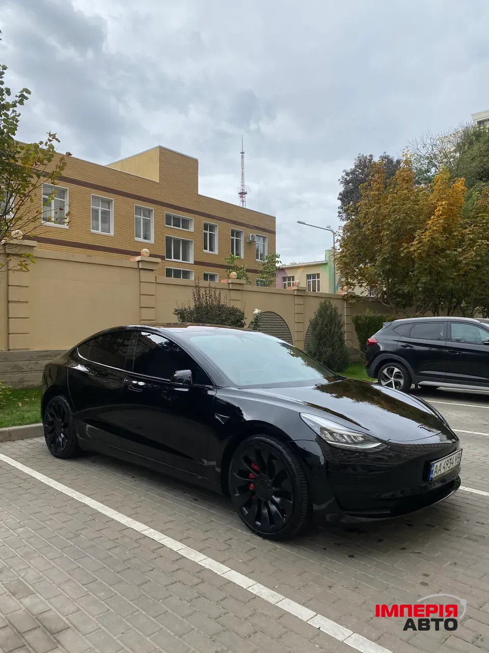 Tesla Model 3 - фото 1