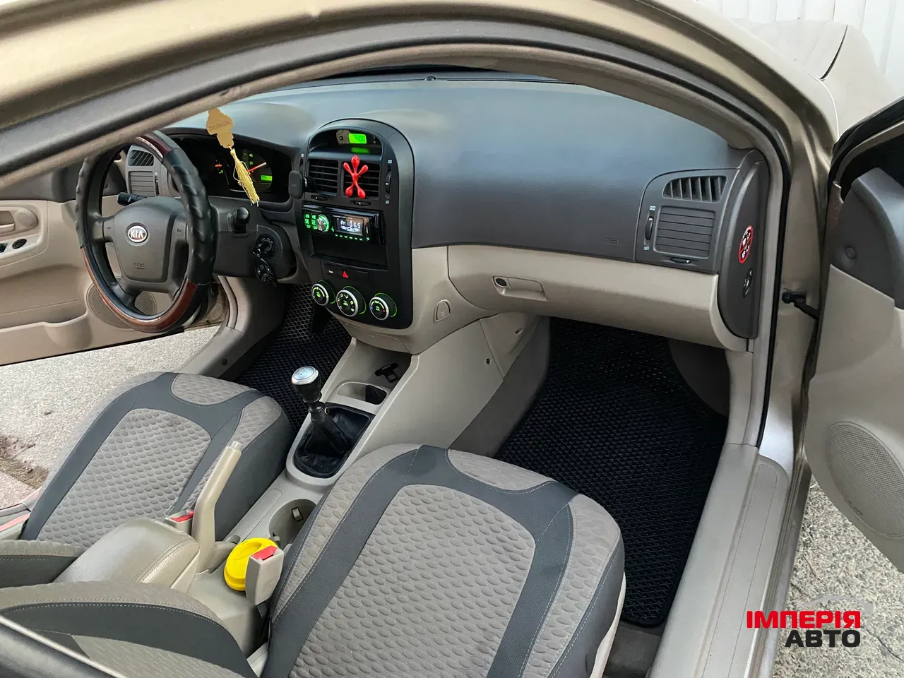 Kia Cerato - фото 16