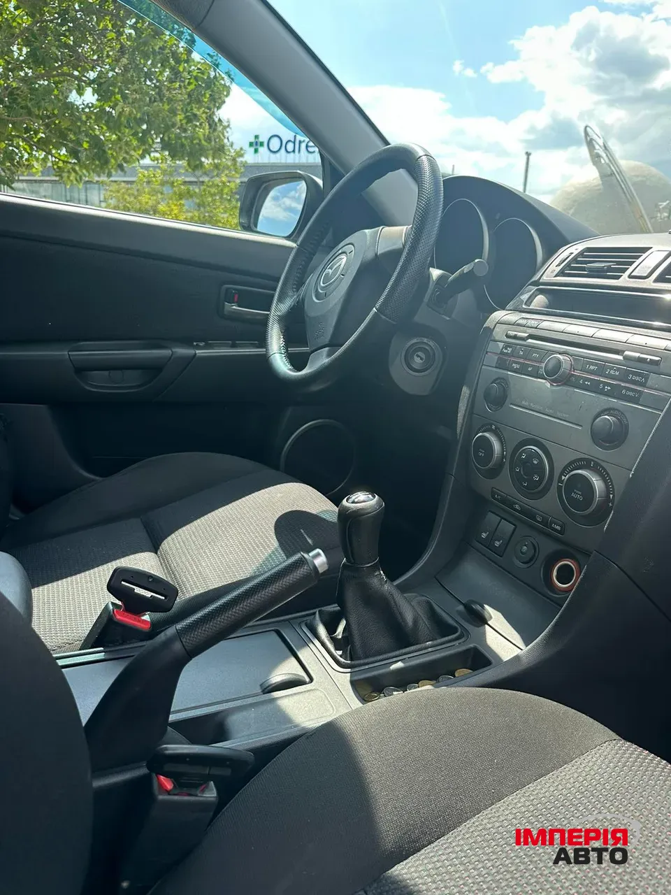 Mazda 3 - фото 5