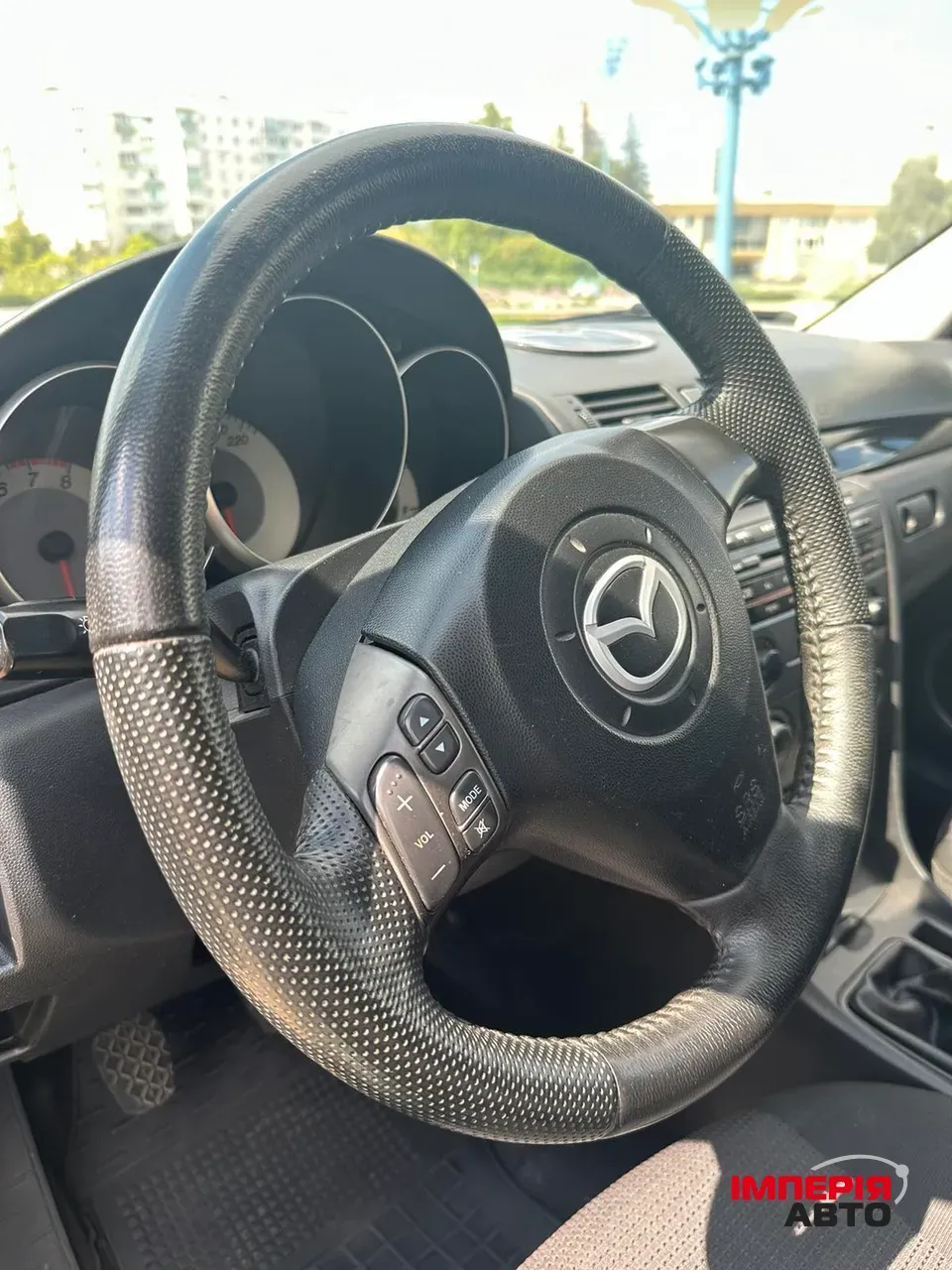 Mazda 3 - фото 6