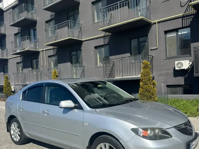 Mazda 3 - фото 1