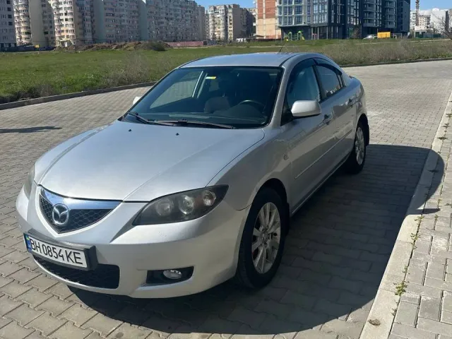 Mazda 3 - фото 2