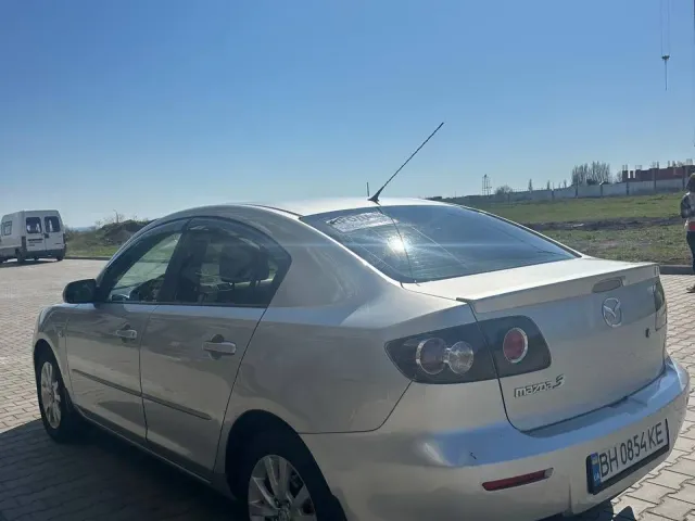 Mazda 3 - фото 4