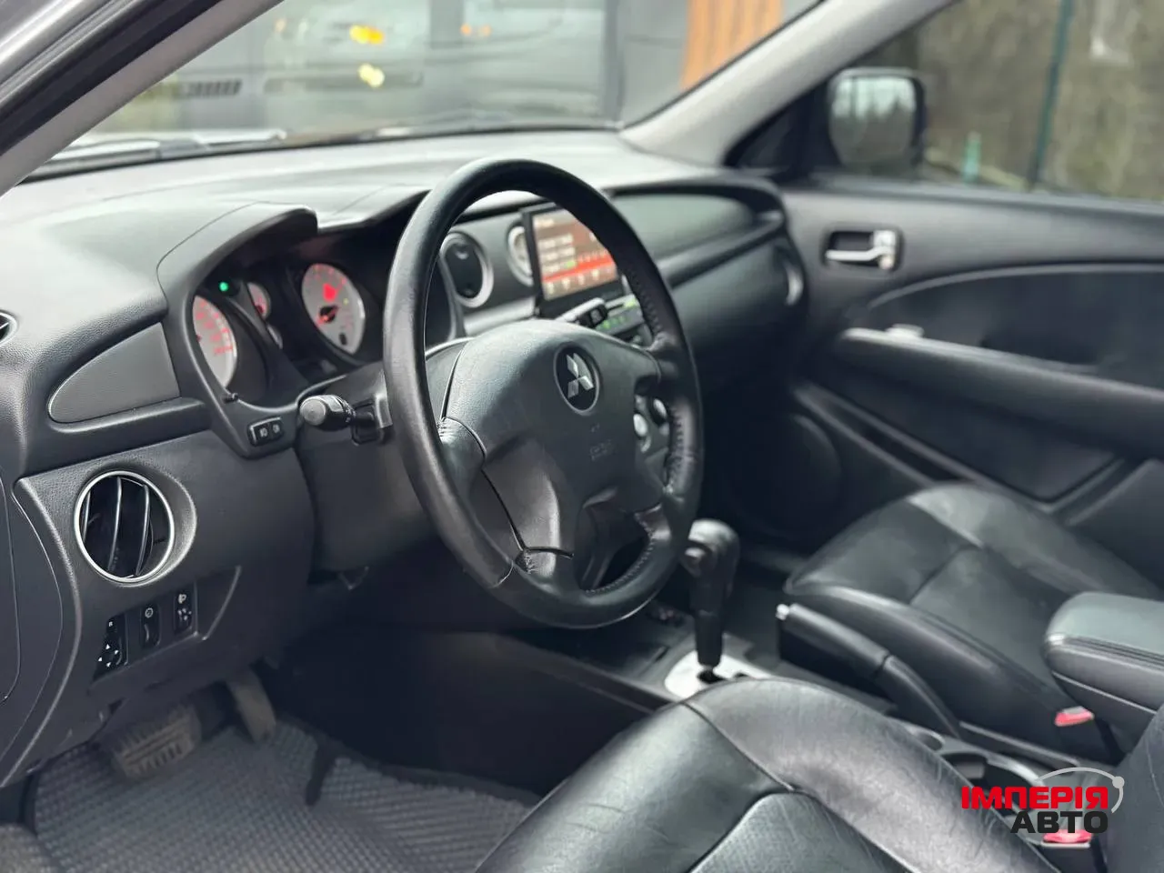 Mitsubishi Outlander - фото 8