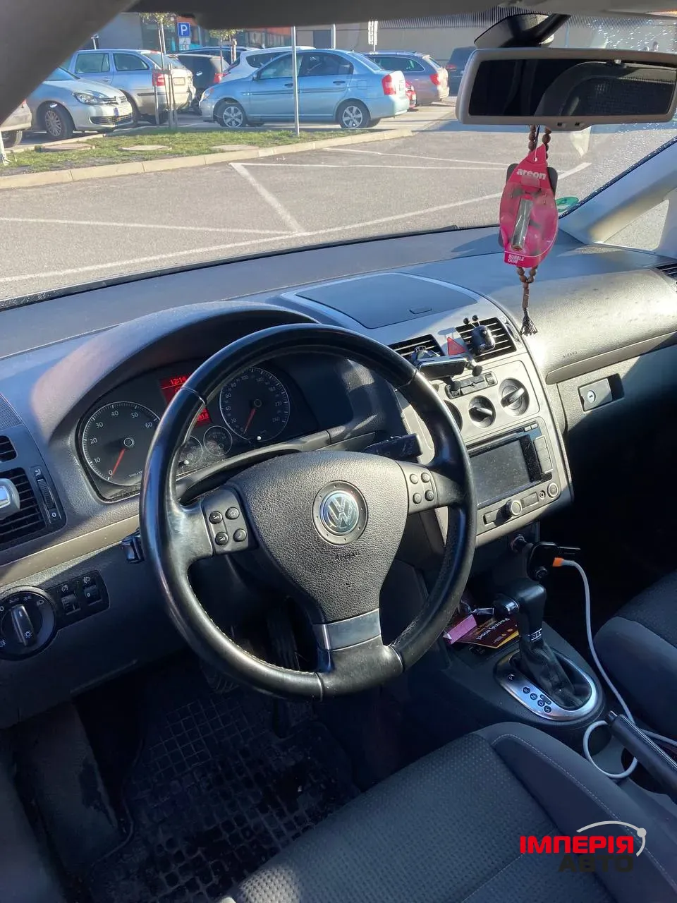 Volkswagen Touran - фото 5