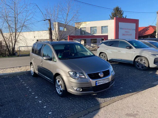 Volkswagen Touran - фото 2