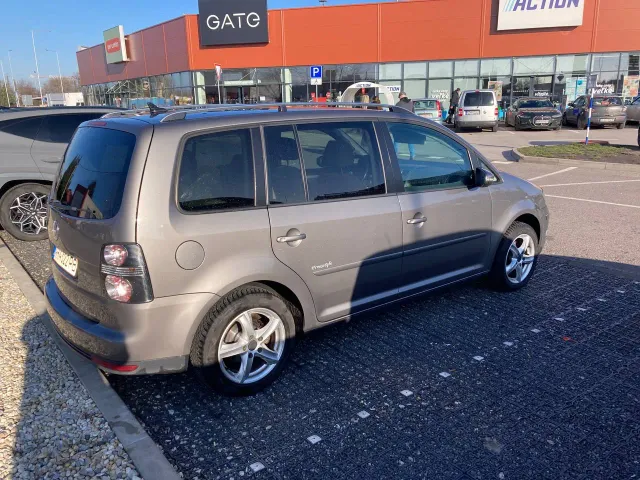 Volkswagen Touran - фото 1