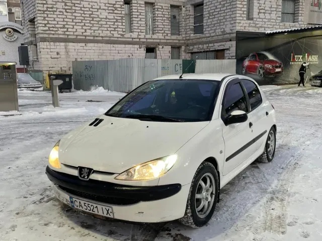 Peugeot 206 - фото 1