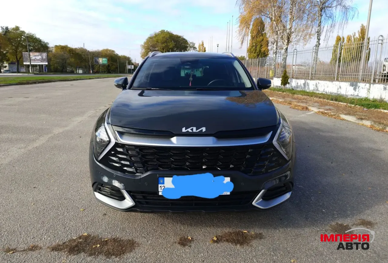 Kia Sportage - фото 1