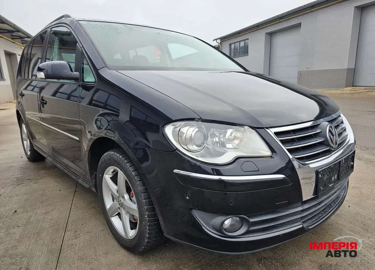 Volkswagen Touran - фото 17