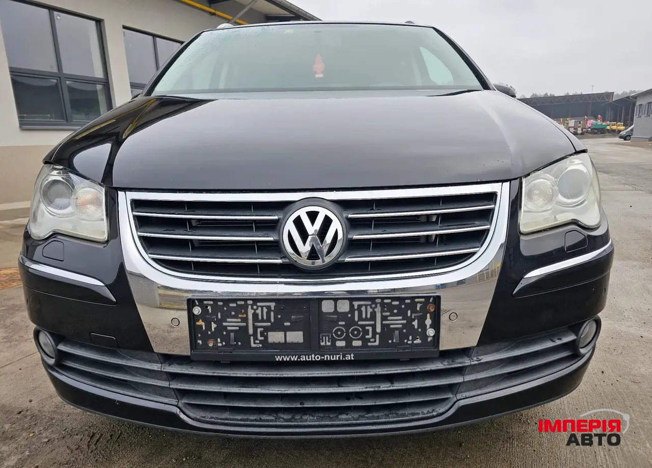 Volkswagen Touran - фото 18