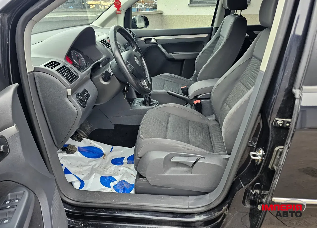 Volkswagen Touran - фото 11