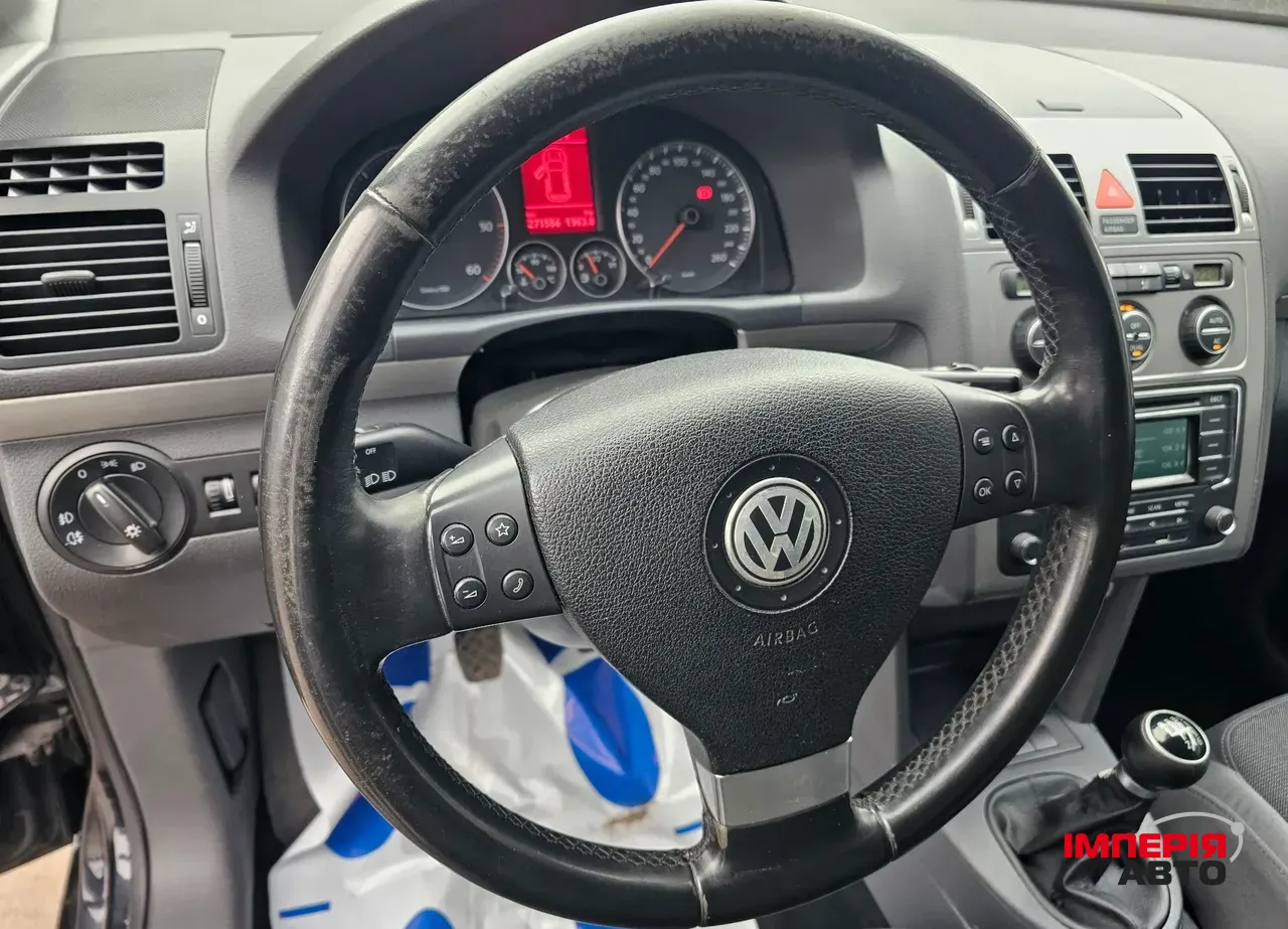 Volkswagen Touran - фото 6