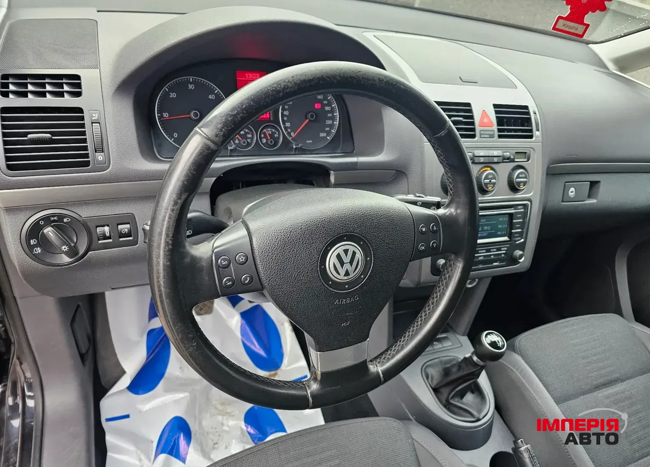 Volkswagen Touran - фото 9