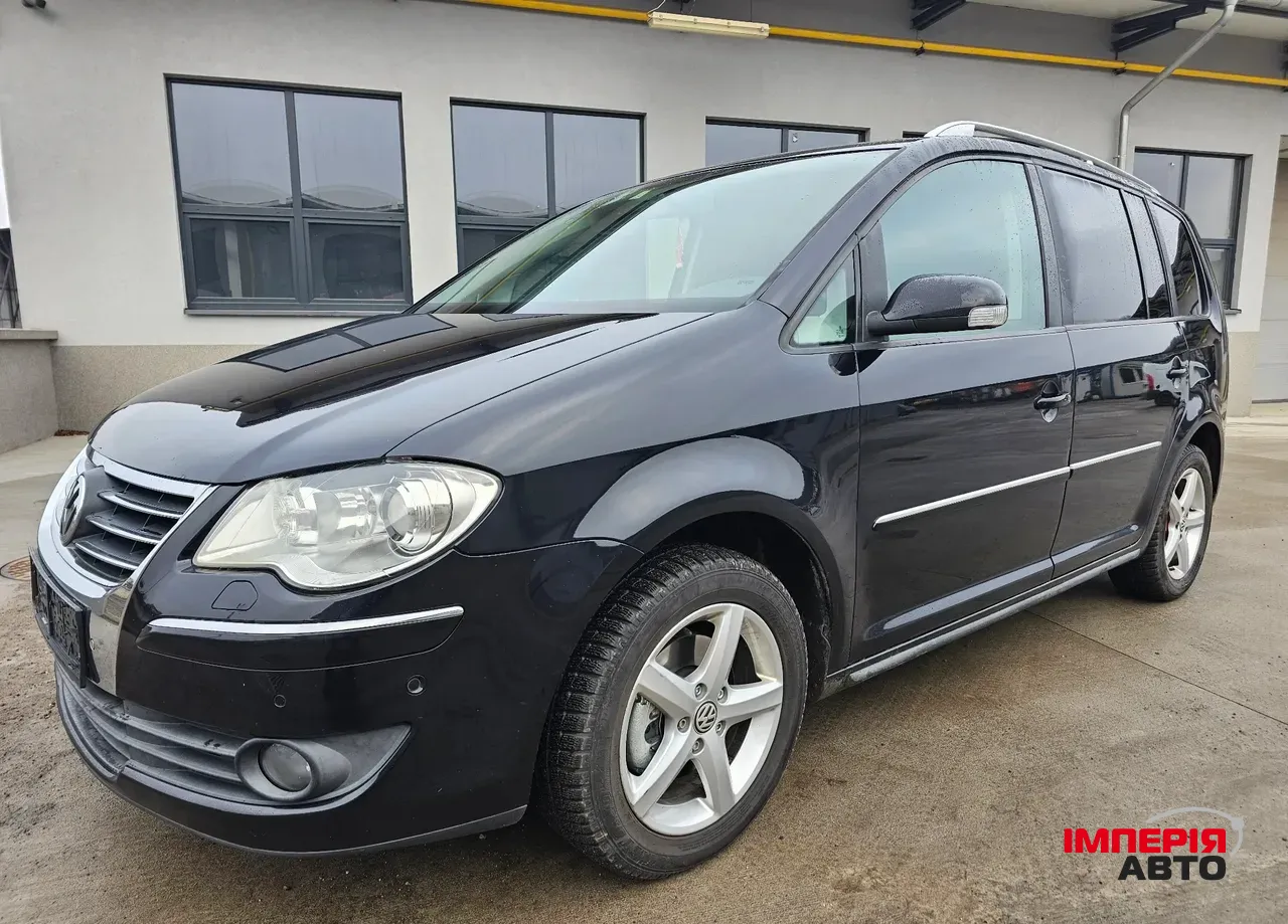 Volkswagen Touran - фото 19