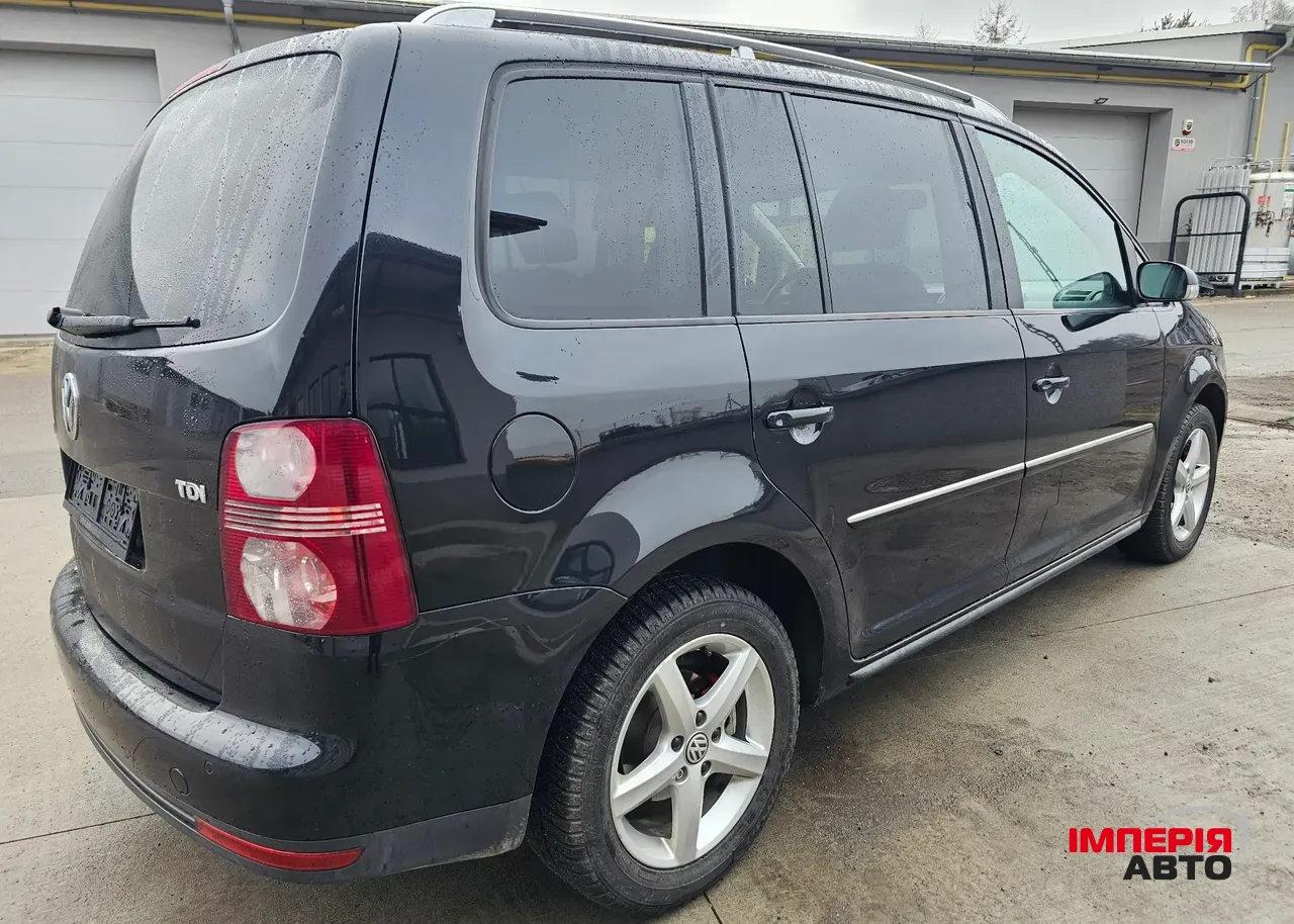 Volkswagen Touran - фото 15