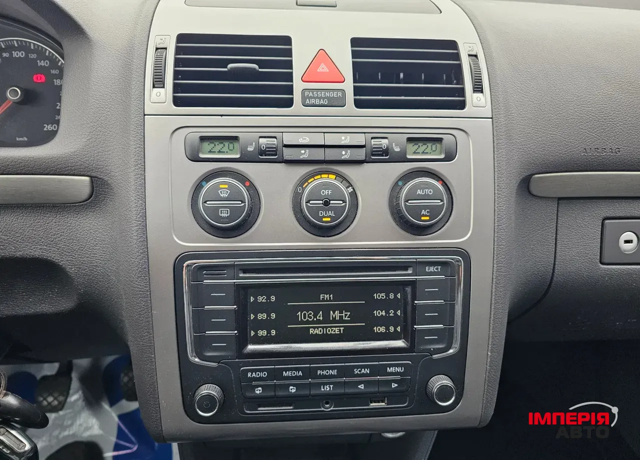 Volkswagen Touran - фото 4