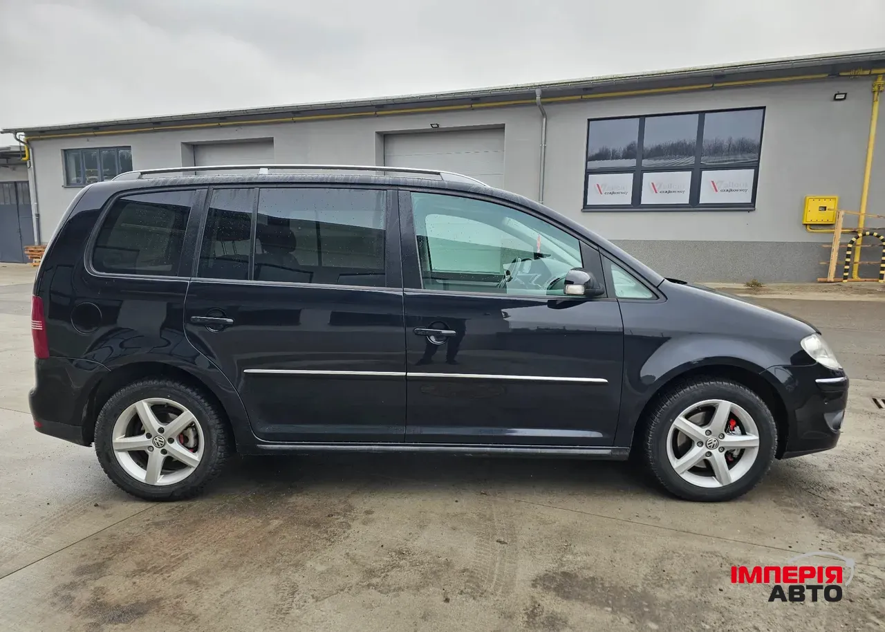 Volkswagen Touran - фото 16