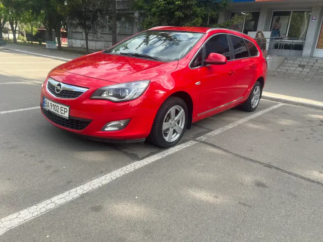 Opel Astra - фото 1