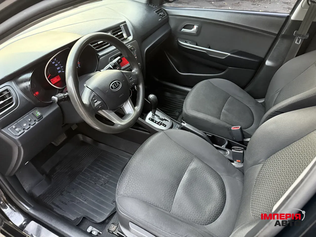 Kia Rio - фото 12