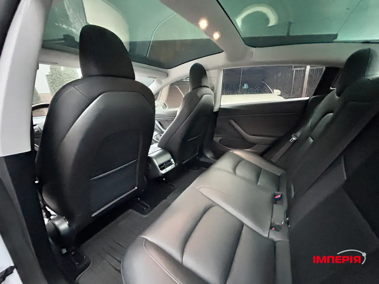 Tesla Model 3 - фото 10