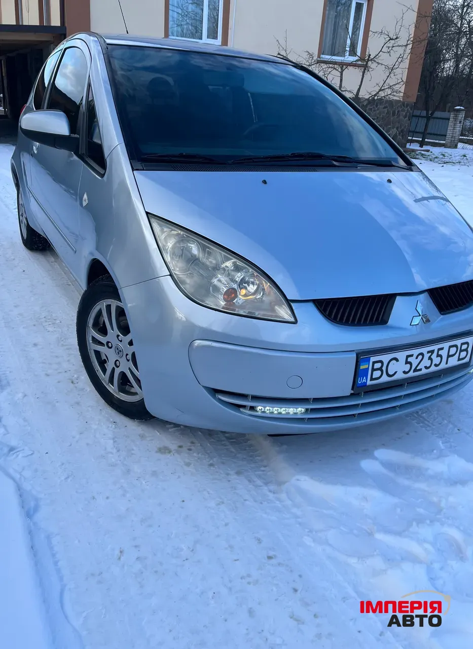 Mitsubishi Colt - фото 1