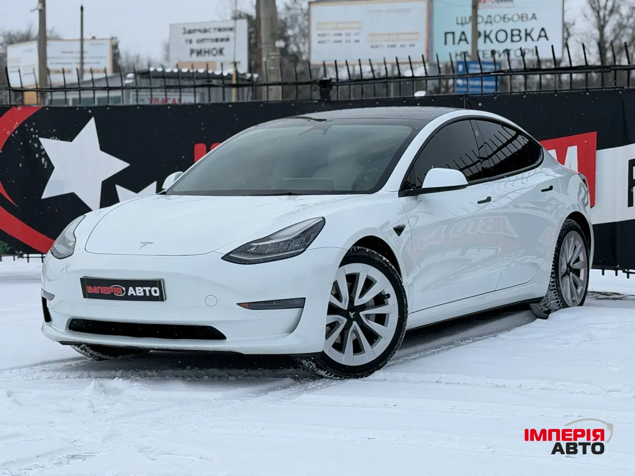 Tesla Model 3 - фото 1