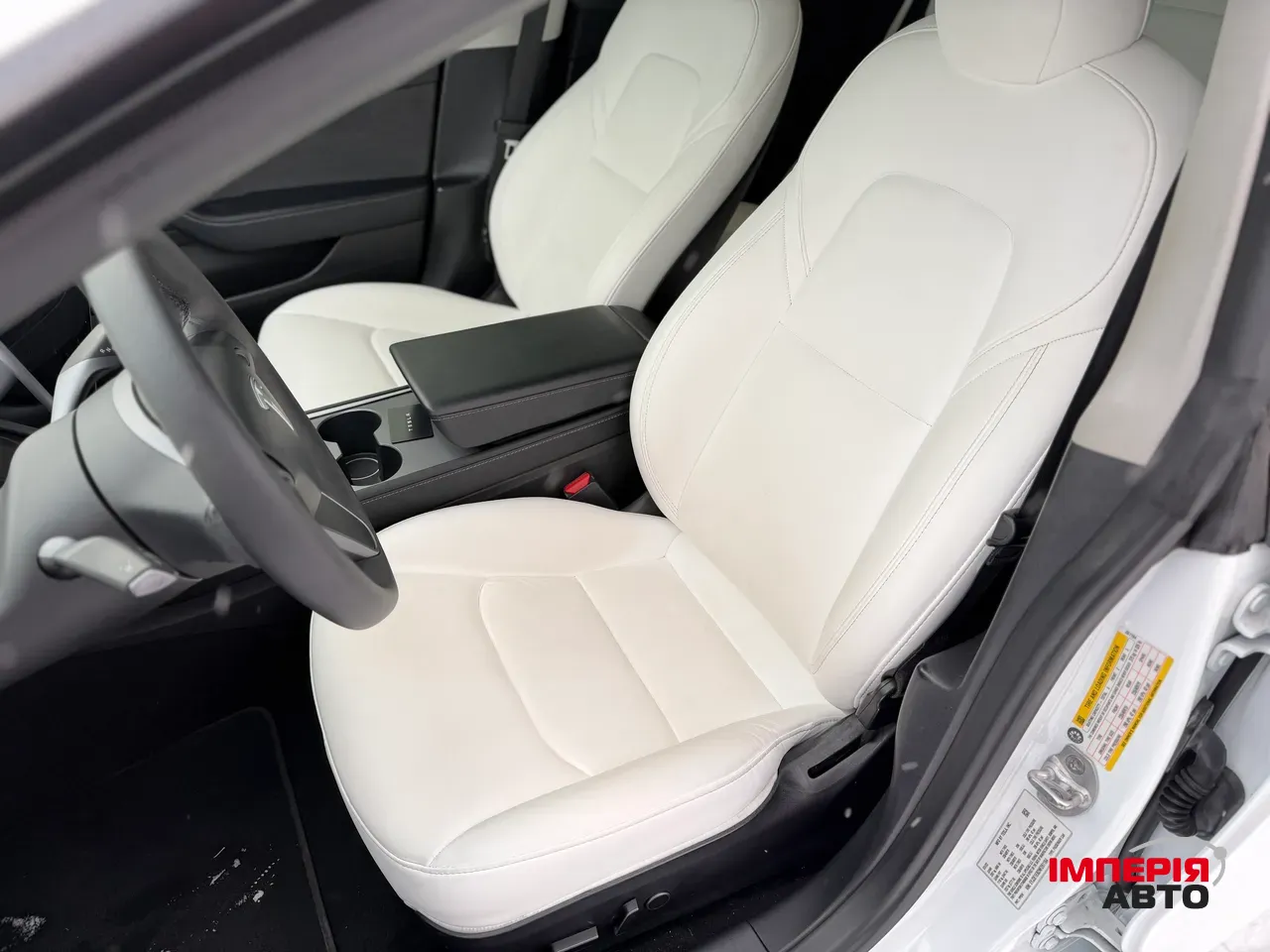 Tesla Model 3 - фото 7