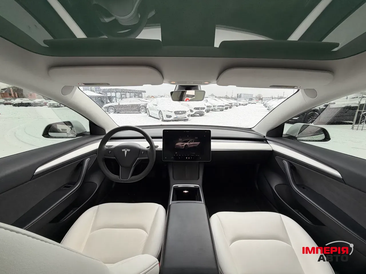 Tesla Model 3 - фото 12