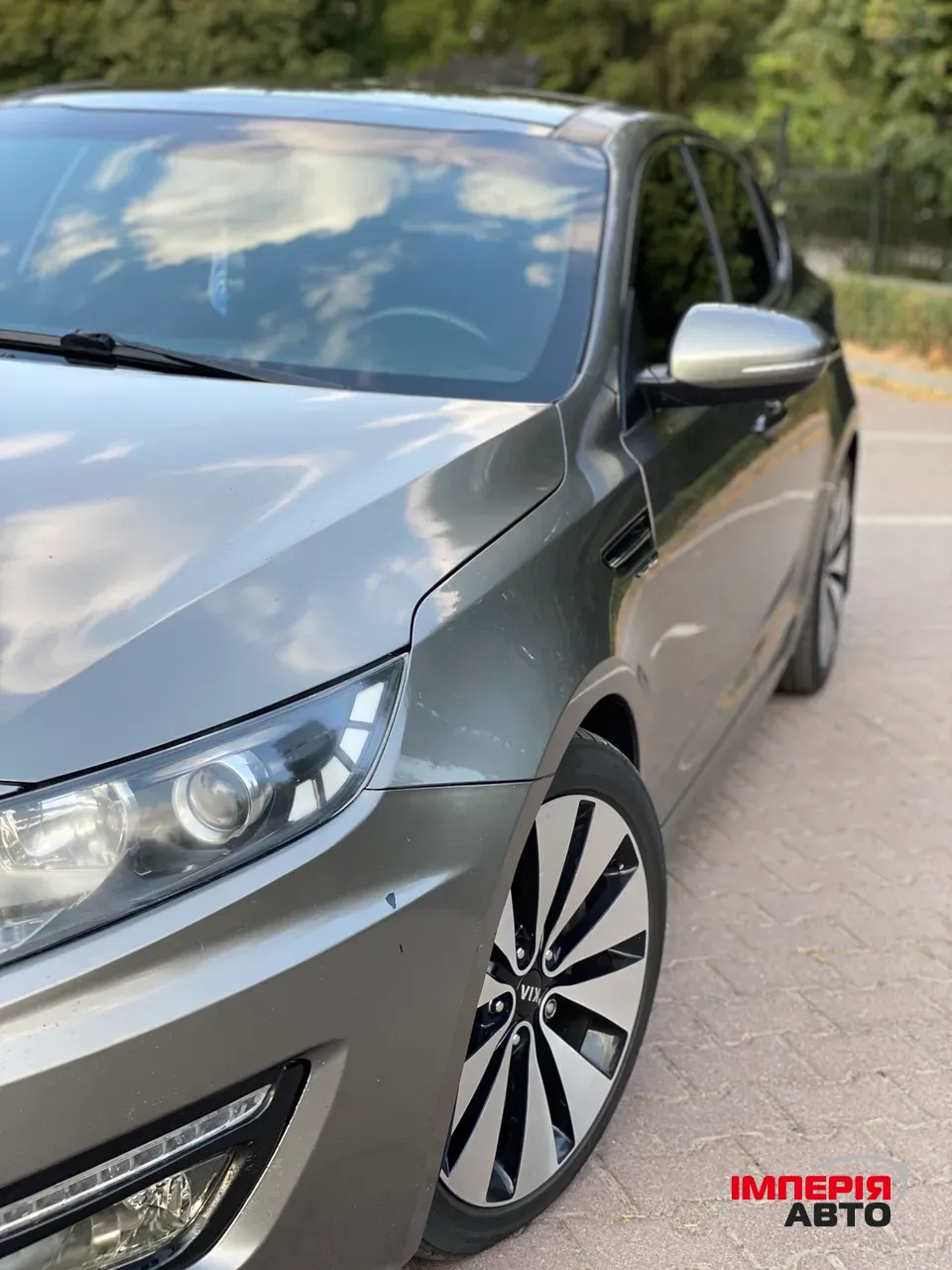 Kia Optima - фото 5