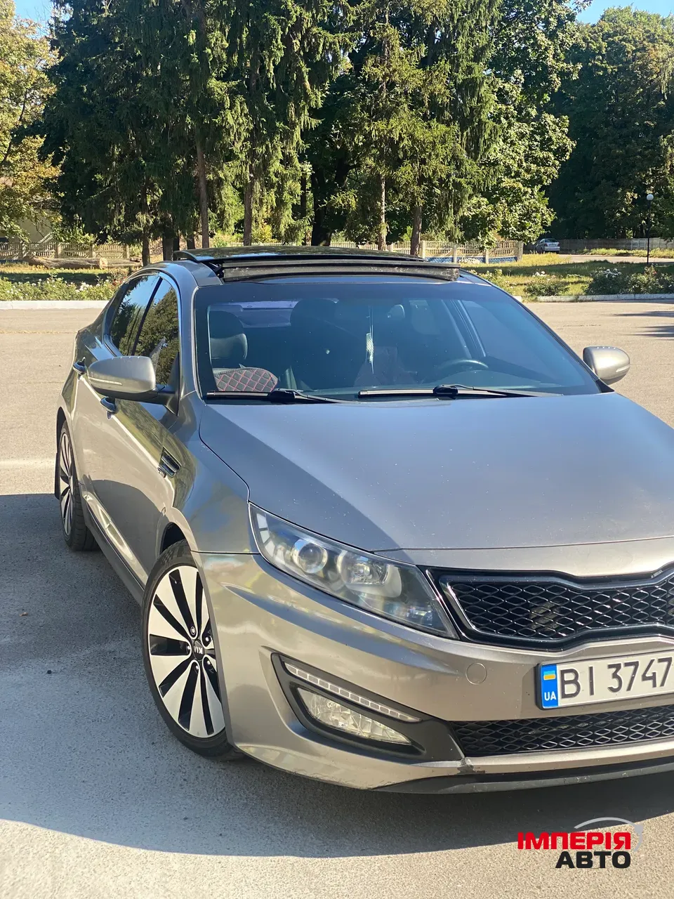 Kia Optima - фото 1