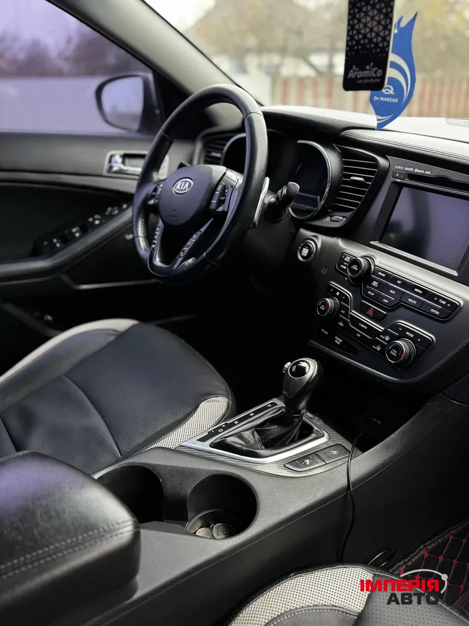 Kia Optima - фото 11