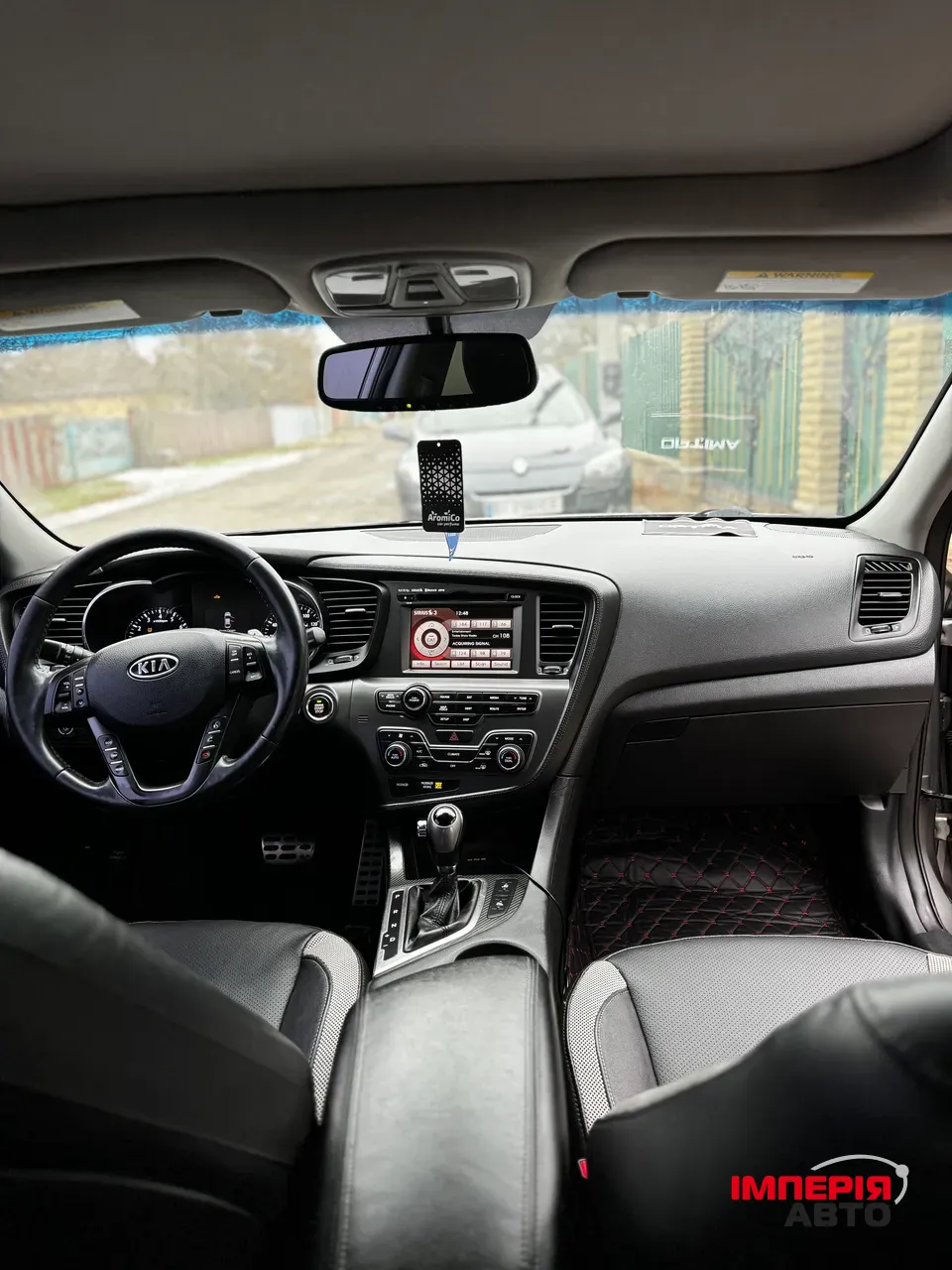 Kia Optima - фото 10