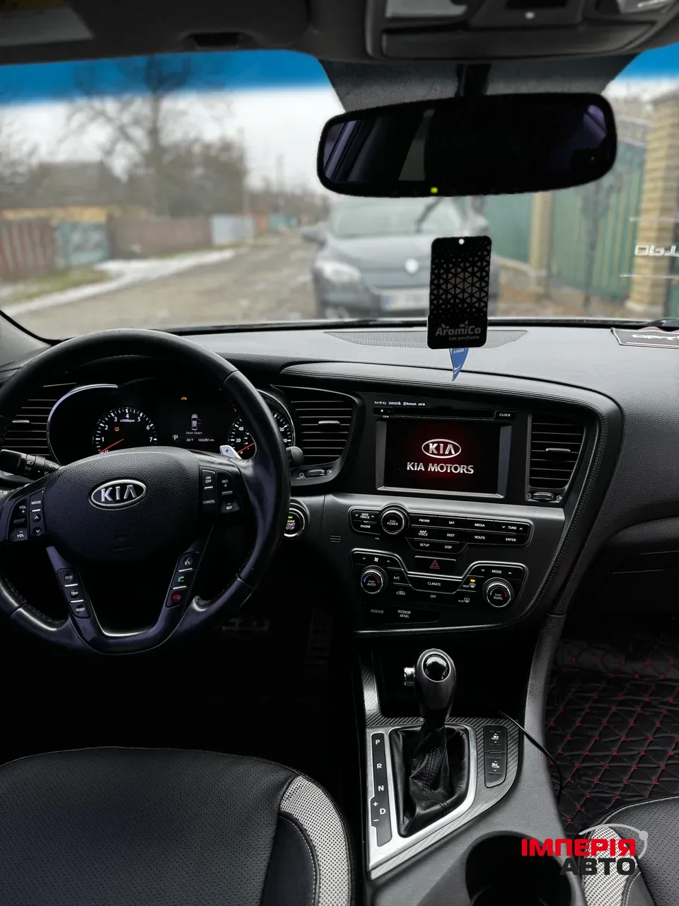 Kia Optima - фото 12