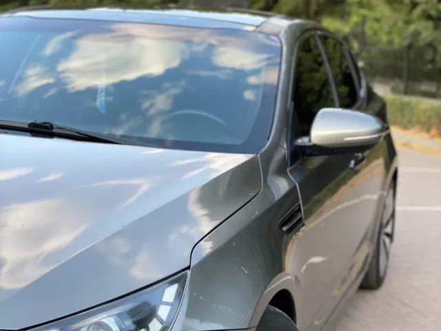 Kia Optima - фото 5