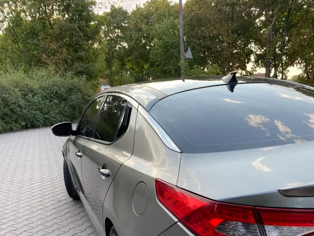 Kia Optima - фото 4